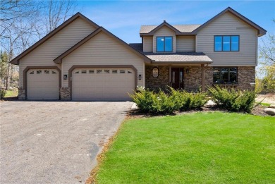 Tucked within the prestigious and serene Lake Riley Woods on Halla Green Executive Golf Course in Minnesota - for sale on GolfHomes.com, golf home, golf lot