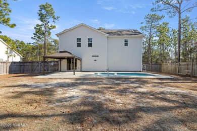 Enjoy life indoors & outdoors in this turnkey 4 bedroom 2 1/2 on The Lakes Country Club in North Carolina - for sale on GolfHomes.com, golf home, golf lot