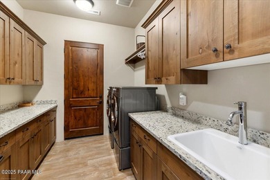 Views, golf, and luxury. Framed by iconic Granite Mountain views on Talking Rock Golf Club in Arizona - for sale on GolfHomes.com, golf home, golf lot