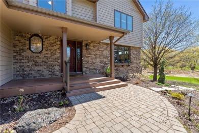 Tucked within the prestigious and serene Lake Riley Woods on Halla Green Executive Golf Course in Minnesota - for sale on GolfHomes.com, golf home, golf lot