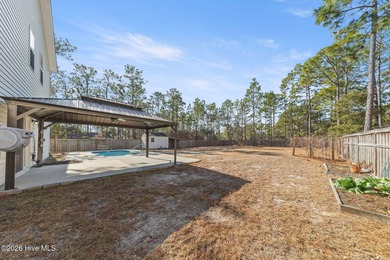 Enjoy life indoors & outdoors in this turnkey 4 bedroom 2 1/2 on The Lakes Country Club in North Carolina - for sale on GolfHomes.com, golf home, golf lot