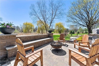 Tucked within the prestigious and serene Lake Riley Woods on Halla Green Executive Golf Course in Minnesota - for sale on GolfHomes.com, golf home, golf lot
