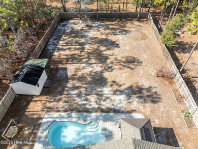 Enjoy life indoors & outdoors in this turnkey 4 bedroom 2 1/2 on The Lakes Country Club in North Carolina - for sale on GolfHomes.com, golf home, golf lot