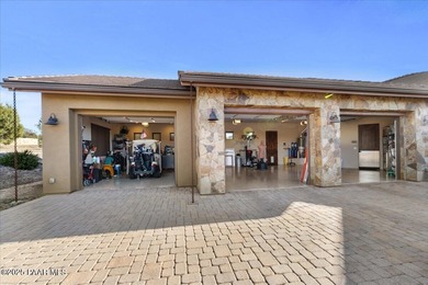 Views, golf, and luxury. Framed by iconic Granite Mountain views on Talking Rock Golf Club in Arizona - for sale on GolfHomes.com, golf home, golf lot
