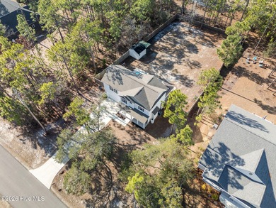 Enjoy life indoors & outdoors in this turnkey 4 bedroom 2 1/2 on The Lakes Country Club in North Carolina - for sale on GolfHomes.com, golf home, golf lot