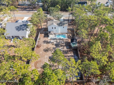 Enjoy life indoors & outdoors in this turnkey 4 bedroom 2 1/2 on The Lakes Country Club in North Carolina - for sale on GolfHomes.com, golf home, golf lot