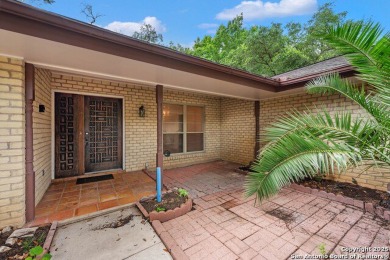 With lovely vistas of the Windcrest golf course, this spacious on Windcrest Golf Club in Texas - for sale on GolfHomes.com, golf home, golf lot