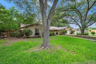 With lovely vistas of the Windcrest golf course, this spacious on Windcrest Golf Club in Texas - for sale on GolfHomes.com, golf home, golf lot
