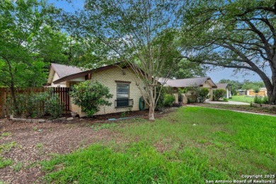 With lovely vistas of the Windcrest golf course, this spacious on Windcrest Golf Club in Texas - for sale on GolfHomes.com, golf home, golf lot