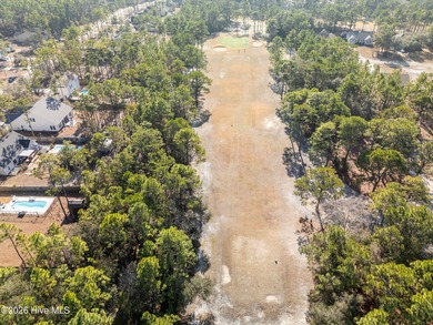 Enjoy life indoors & outdoors in this turnkey 4 bedroom 2 1/2 on The Lakes Country Club in North Carolina - for sale on GolfHomes.com, golf home, golf lot