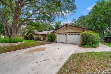 With lovely vistas of the Windcrest golf course, this spacious on Windcrest Golf Club in Texas - for sale on GolfHomes.com, golf home, golf lot