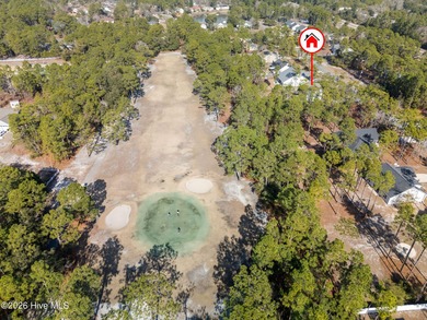 Enjoy life indoors & outdoors in this turnkey 4 bedroom 2 1/2 on The Lakes Country Club in North Carolina - for sale on GolfHomes.com, golf home, golf lot