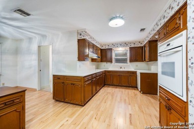 With lovely vistas of the Windcrest golf course, this spacious on Windcrest Golf Club in Texas - for sale on GolfHomes.com, golf home, golf lot