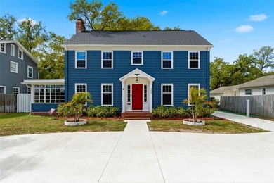 Dream home alert! This stunning 5 bedroom 3 1/2 bath Colonial on Clearwater Country Club in Florida - for sale on GolfHomes.com, golf home, golf lot