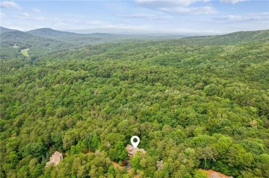 Located on a 1.5 acre lot within the gated mountain community of on Big Canoe Golf Club - Cherokee in Georgia - for sale on GolfHomes.com, golf home, golf lot