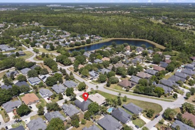Welcome to this beautifully maintained 4-bedroom, 2-bath home in on King and Bear Golf Course/World Golf Village in Florida - for sale on GolfHomes.com, golf home, golf lot