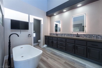 UPDATED GARDENS WEST ON ELEVATED LOT OVERLOOKING GOLF COURSE on Spanish Trail Golf and Country Club in Nevada - for sale on GolfHomes.com, golf home, golf lot