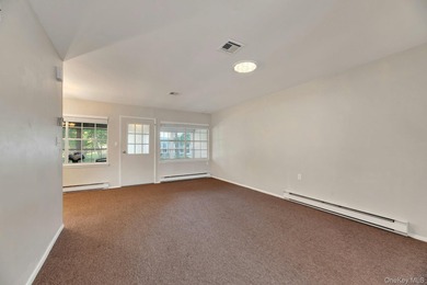 Move right into this beautifully maintained two-bedroom on Leisure Village Golf Course in New York - for sale on GolfHomes.com, golf home, golf lot