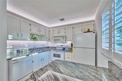 Turnkey 2nd Fl /2BR/2BA Condo /GOLF & WATER VIEWS. Welcome to on The American Golf Club in Florida - for sale on GolfHomes.com, golf home, golf lot