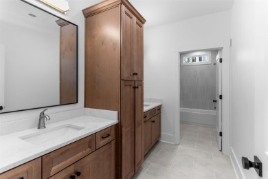 EXPERIENCE THE PERFECT BLEND OF LUXURY AND COMFORT IN THIS on Harbor Club Golf and Country Club in Georgia - for sale on GolfHomes.com, golf home, golf lot
