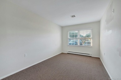 Move right into this beautifully maintained two-bedroom on Leisure Village Golf Course in New York - for sale on GolfHomes.com, golf home, golf lot