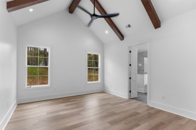 EXPERIENCE THE PERFECT BLEND OF LUXURY AND COMFORT IN THIS on Harbor Club Golf and Country Club in Georgia - for sale on GolfHomes.com, golf home, golf lot
