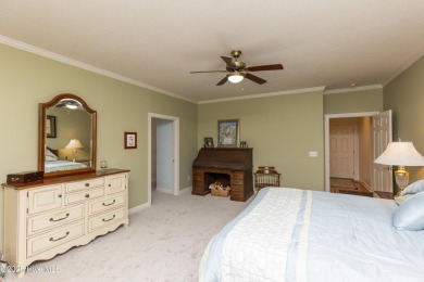 Situated in a peaceful cul-de-sac, this home sits on a large 2 on Pinewild Country Club of Pinehurst in North Carolina - for sale on GolfHomes.com, golf home, golf lot