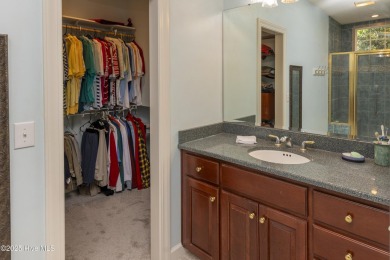 Situated in a peaceful cul-de-sac, this home sits on a large 2 on Pinewild Country Club of Pinehurst in North Carolina - for sale on GolfHomes.com, golf home, golf lot