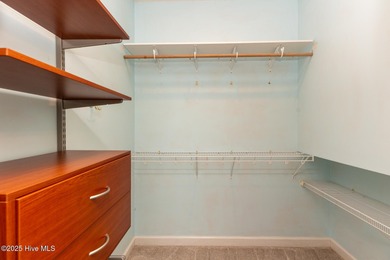 Situated in a peaceful cul-de-sac, this home sits on a large 2 on Pinewild Country Club of Pinehurst in North Carolina - for sale on GolfHomes.com, golf home, golf lot