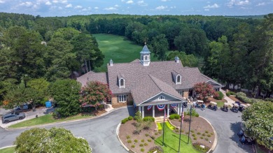 EXPERIENCE THE PERFECT BLEND OF LUXURY AND COMFORT IN THIS on Harbor Club Golf and Country Club in Georgia - for sale on GolfHomes.com, golf home, golf lot