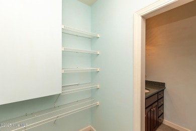 Situated in a peaceful cul-de-sac, this home sits on a large 2 on Pinewild Country Club of Pinehurst in North Carolina - for sale on GolfHomes.com, golf home, golf lot