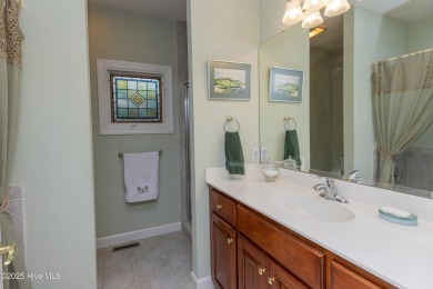 Situated in a peaceful cul-de-sac, this home sits on a large 2 on Pinewild Country Club of Pinehurst in North Carolina - for sale on GolfHomes.com, golf home, golf lot