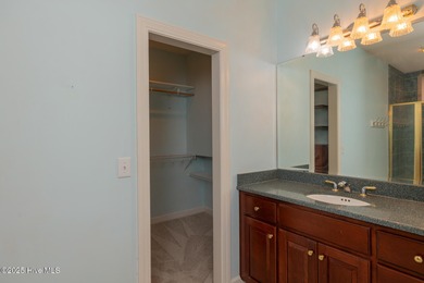 Situated in a peaceful cul-de-sac, this home sits on a large 2 on Pinewild Country Club of Pinehurst in North Carolina - for sale on GolfHomes.com, golf home, golf lot