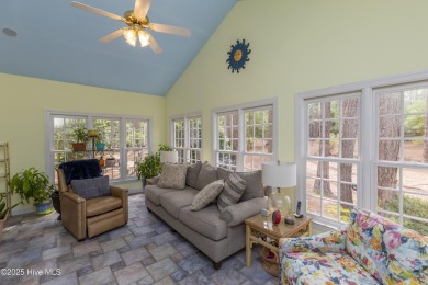 Situated in a peaceful cul-de-sac, this home sits on a large 2 on Pinewild Country Club of Pinehurst in North Carolina - for sale on GolfHomes.com, golf home, golf lot