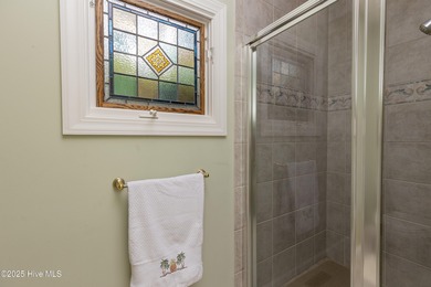 Situated in a peaceful cul-de-sac, this home sits on a large 2 on Pinewild Country Club of Pinehurst in North Carolina - for sale on GolfHomes.com, golf home, golf lot