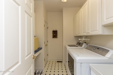 Situated in a peaceful cul-de-sac, this home sits on a large 2 on Pinewild Country Club of Pinehurst in North Carolina - for sale on GolfHomes.com, golf home, golf lot