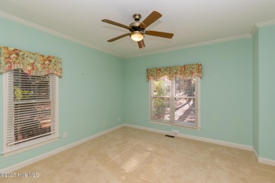 Situated in a peaceful cul-de-sac, this home sits on a large 2 on Pinewild Country Club of Pinehurst in North Carolina - for sale on GolfHomes.com, golf home, golf lot