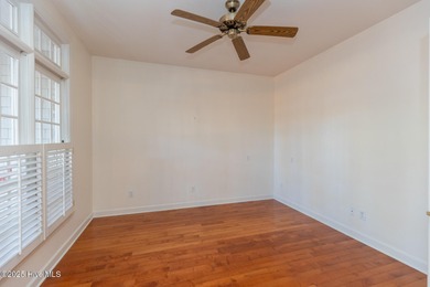 Situated in a peaceful cul-de-sac, this home sits on a large 2 on Pinewild Country Club of Pinehurst in North Carolina - for sale on GolfHomes.com, golf home, golf lot