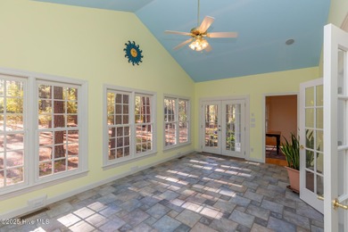 Situated in a peaceful cul-de-sac, this home sits on a large 2 on Pinewild Country Club of Pinehurst in North Carolina - for sale on GolfHomes.com, golf home, golf lot