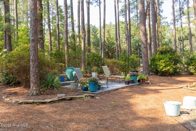 Situated in a peaceful cul-de-sac, this home sits on a large 2 on Pinewild Country Club of Pinehurst in North Carolina - for sale on GolfHomes.com, golf home, golf lot