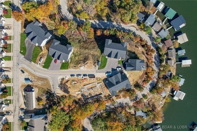 Not yet built villa on premium lake view lot and ready for your on Tan-Tar-A Golf Club in Missouri - for sale on GolfHomes.com, golf home, golf lot