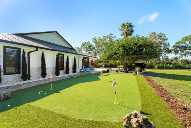 Discover the perfect blend of luxury and country living at 501 on The Cape Club of Palm City in Florida - for sale on GolfHomes.com, golf home, golf lot