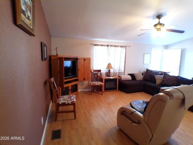 This Stucco 2 Bedroom 2 Full Bath home has an oversized 2nd on Queen Valley Golf Course in Arizona - for sale on GolfHomes.com, golf home, golf lot