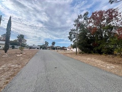 Under contract-accepting backup offers. Set within a calm on Oak Hills Country Club in Florida - for sale on GolfHomes.com, golf home, golf lot