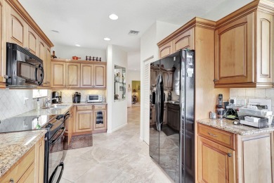 Live the Legends!  Legends is a 2 story condo residence, This on PGA National Golf Club in Florida - for sale on GolfHomes.com, golf home, golf lot