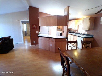 This Stucco 2 Bedroom 2 Full Bath home has an oversized 2nd on Queen Valley Golf Course in Arizona - for sale on GolfHomes.com, golf home, golf lot