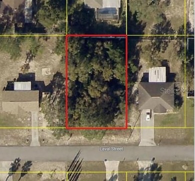 Under contract-accepting backup offers. Set within a calm on Oak Hills Country Club in Florida - for sale on GolfHomes.com, golf home, golf lot