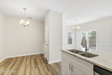 Step into this beautifully renovated home in the highly on Magnolia Greens Golf Plantation in North Carolina - for sale on GolfHomes.com, golf home, golf lot
