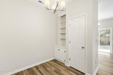 Step into this beautifully renovated home in the highly on Magnolia Greens Golf Plantation in North Carolina - for sale on GolfHomes.com, golf home, golf lot