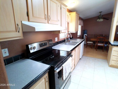 This Stucco 2 Bedroom 2 Full Bath home has an oversized 2nd on Queen Valley Golf Course in Arizona - for sale on GolfHomes.com, golf home, golf lot